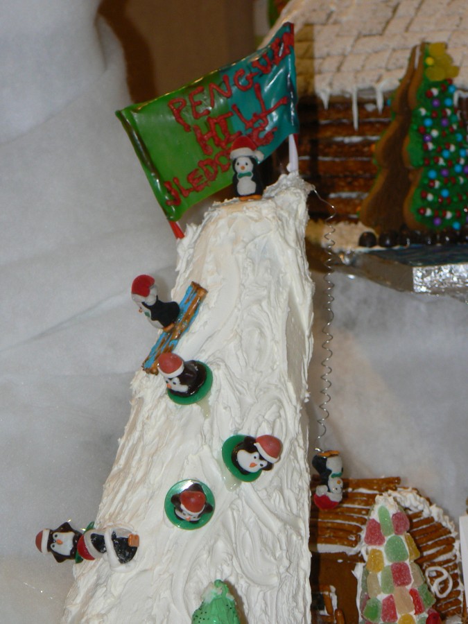 gingerbread houses penguin  sledding