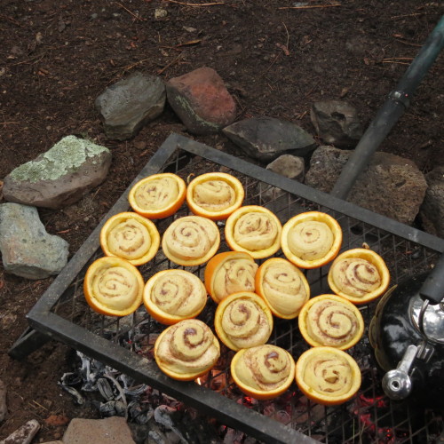 campfire breakfast orange rolls cooked in oranges