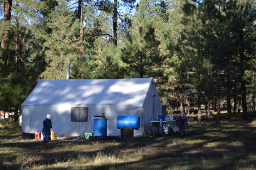 camping in outfitters tent